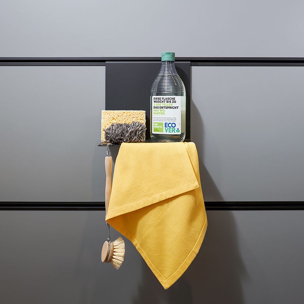 Storage shelf for washing up utensils