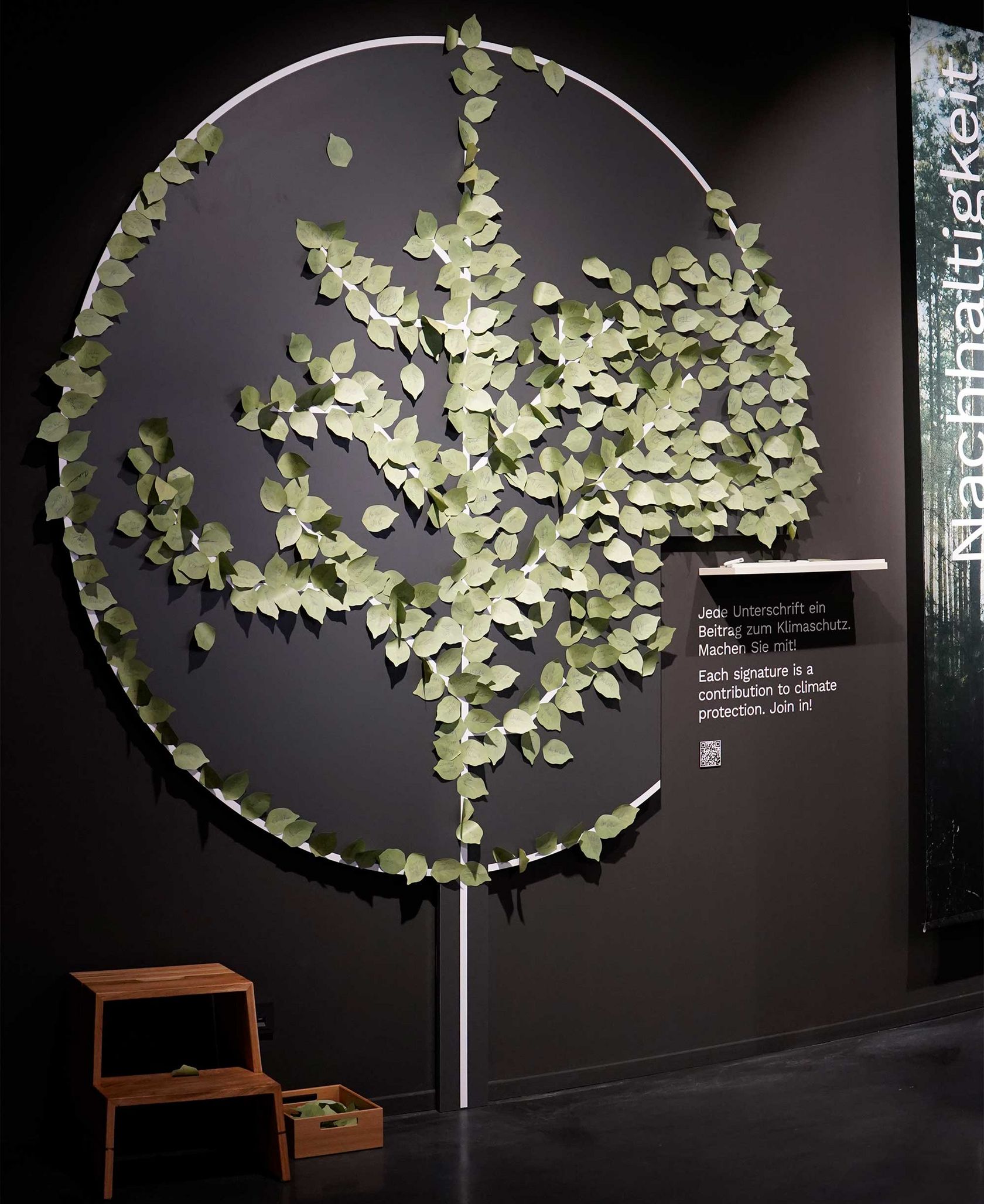 Action board to sign Schüller tree planting campaign