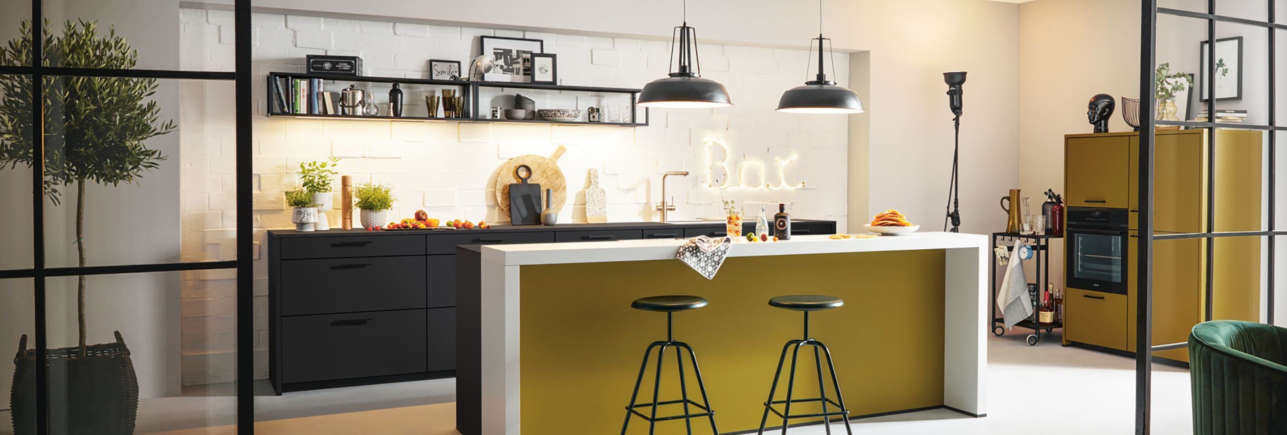 yellow kitchen island with bar