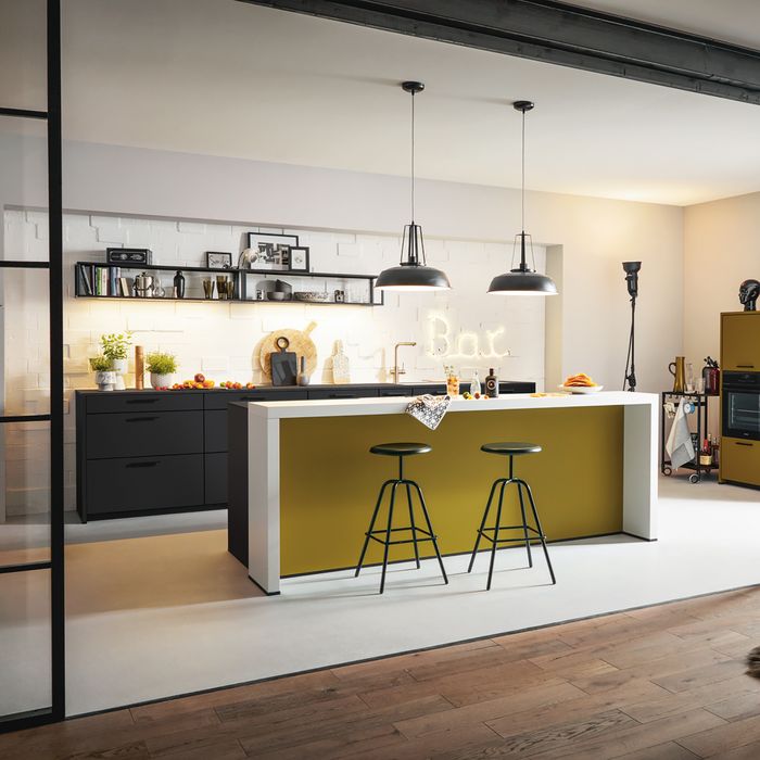 yellow kitchen island with bar