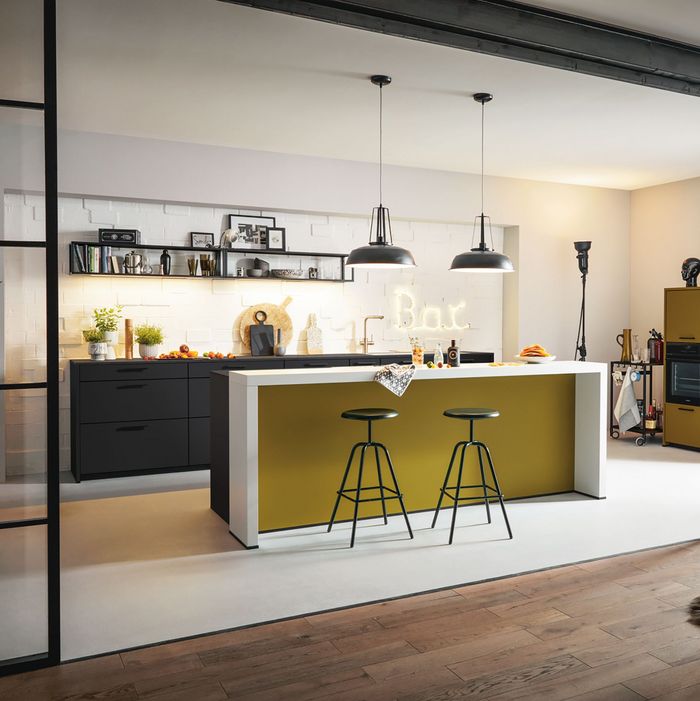yellow kitchen island with bar