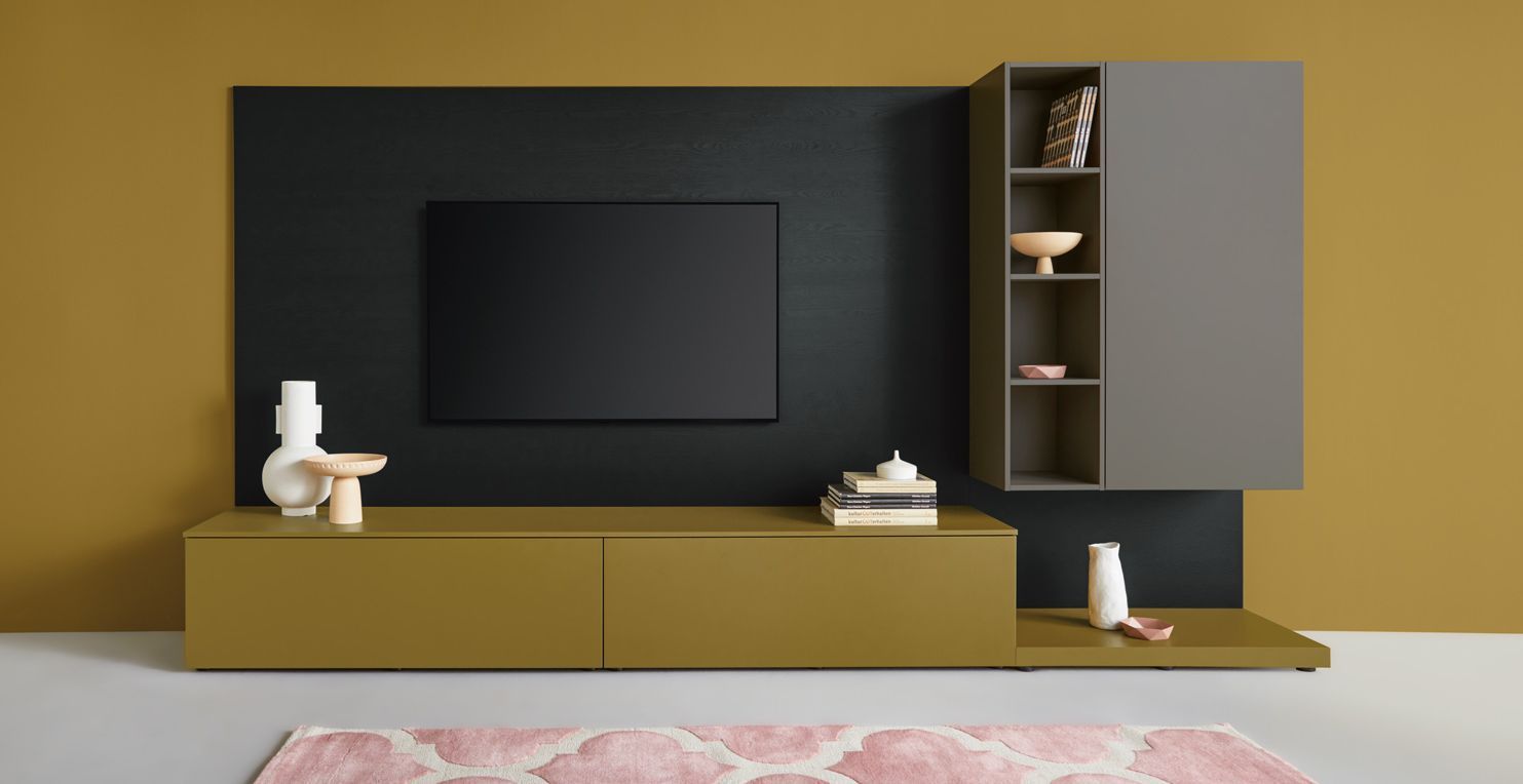 olive green sideboard and TV