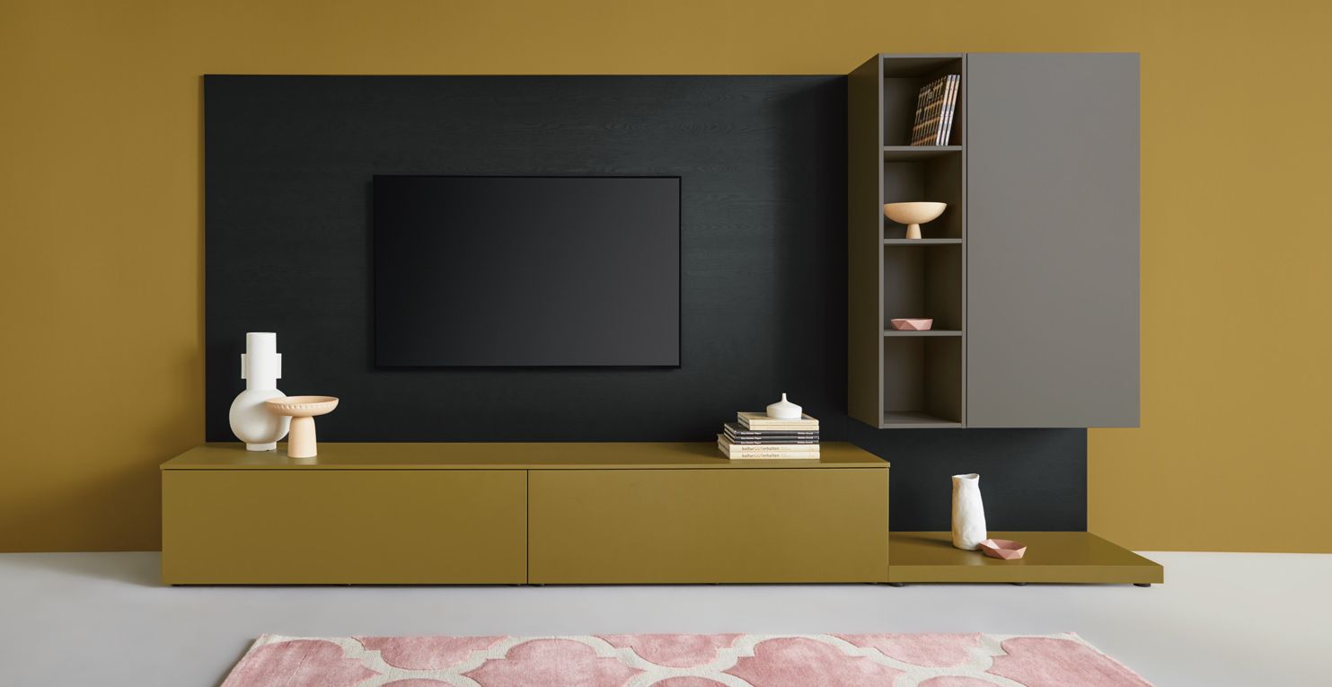 olive green sideboard and TV