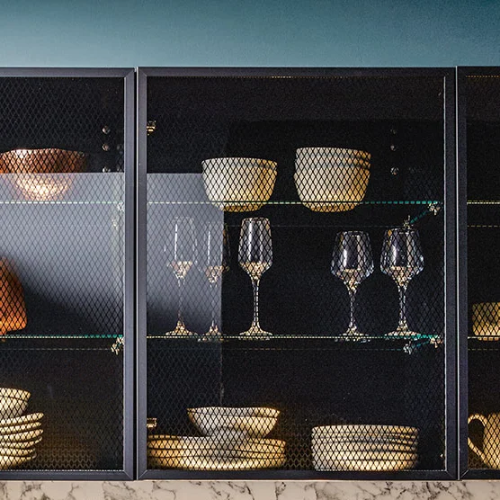 Tall shelf units with black transparent glasses as fronts