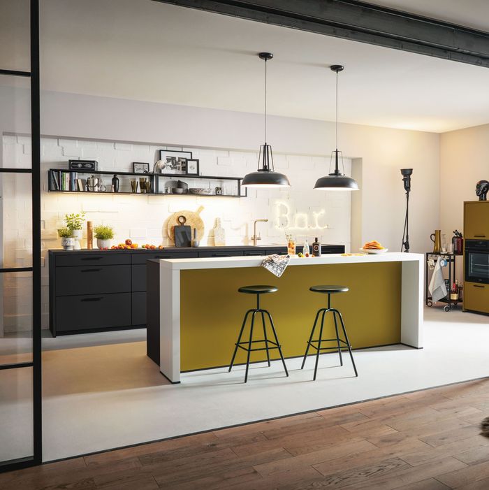 yellow kitchen island with bar